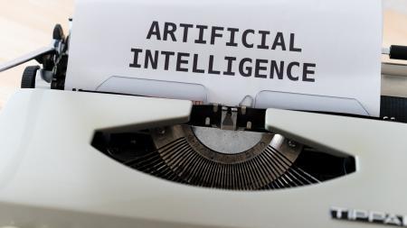 Typewriter with announcement on artificial intelligence 